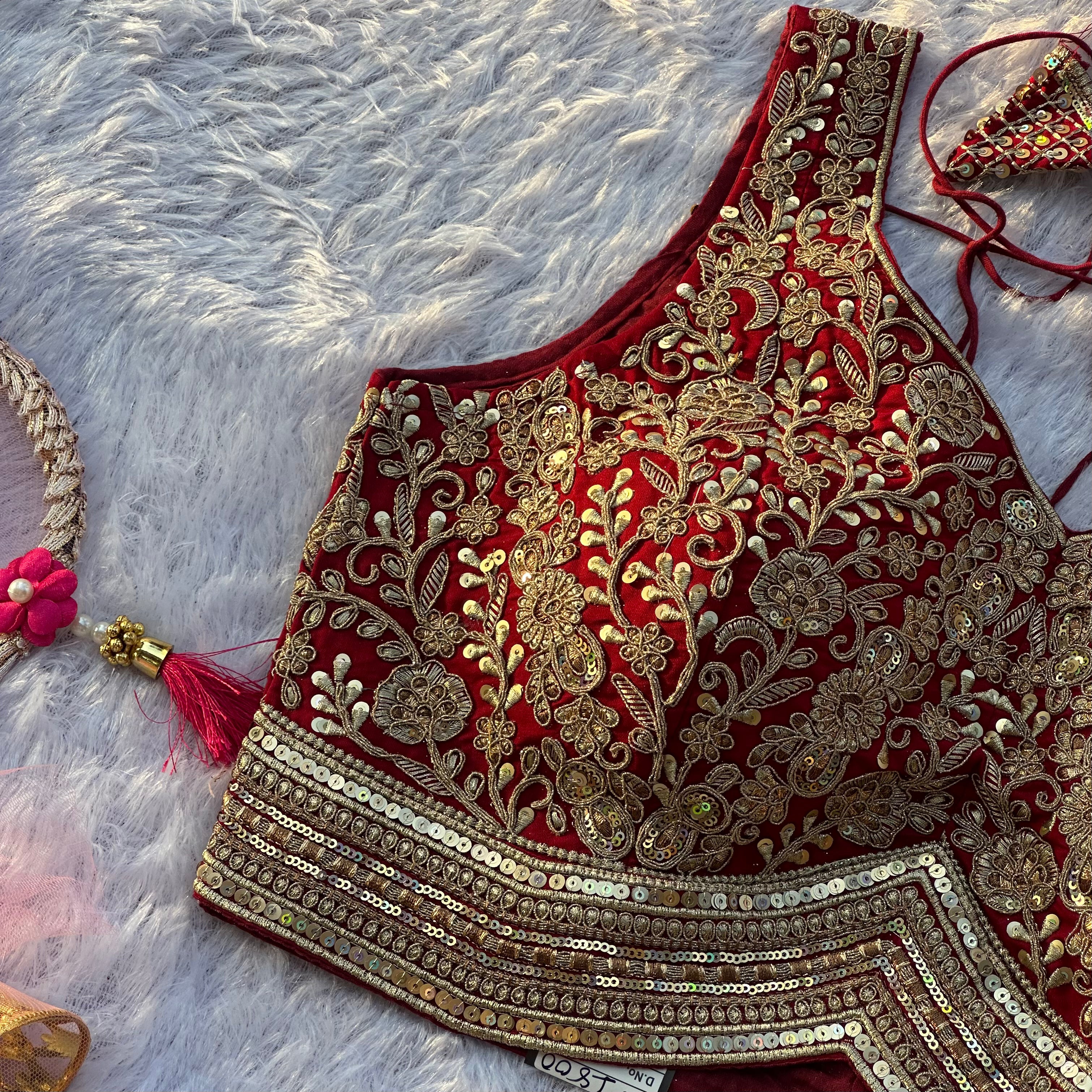 LUXURIOUS MAROON DRIDAL BLOUSE FEATURING INSTRICATE HAND EMBROIDERY WORK